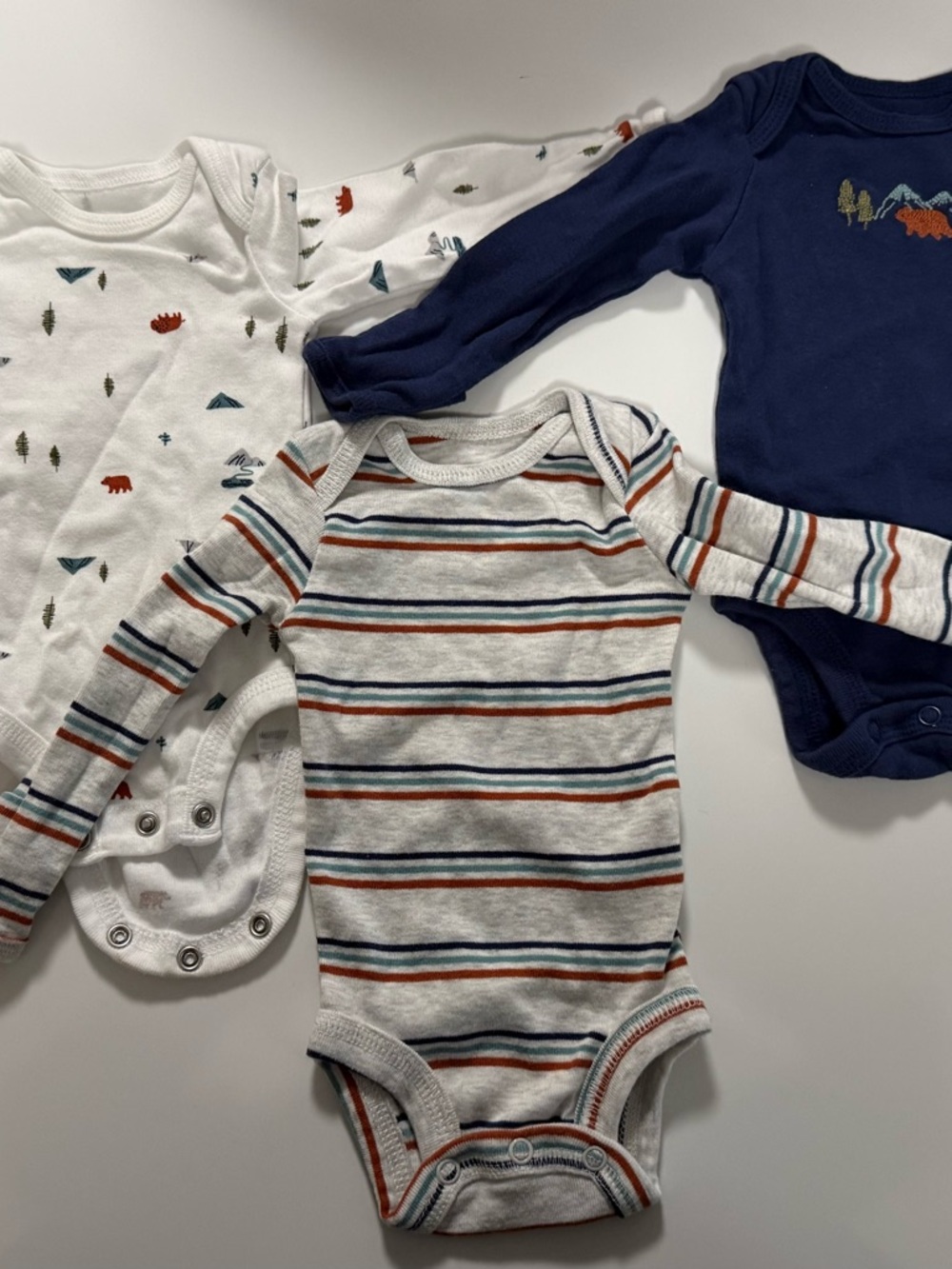 Carter's Striped Long-Sleeve Baby Bodysuits in White, Navy, Orange